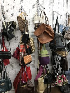 Rack of Purses at STEP on in Thrift Staples