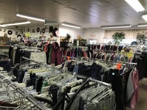 Racks of womens clothes for sale at Sauk Centre STEP